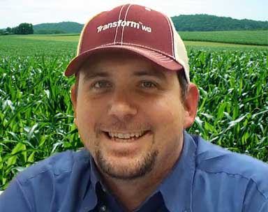reid whittaker in a soy bean field
